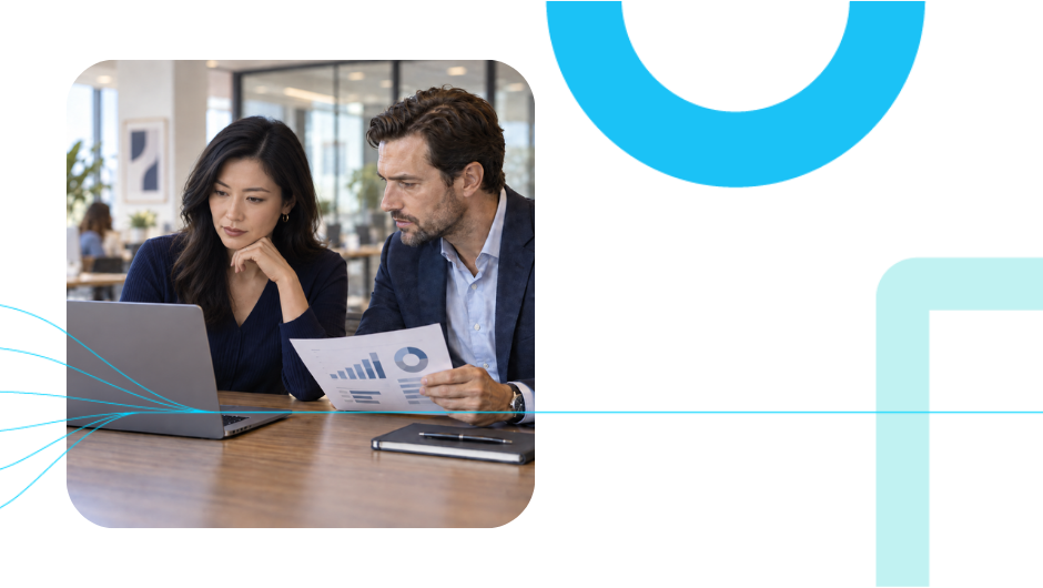 A procurement leader and a colleague reviewing a collections platform cost breakdown on a laptop in a modern office